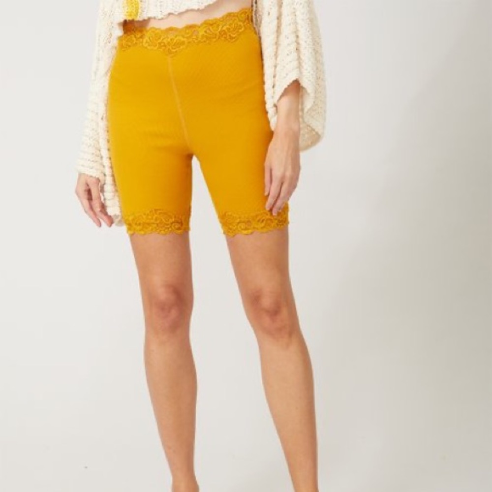 Free People gold lace trim bike short. Size M.